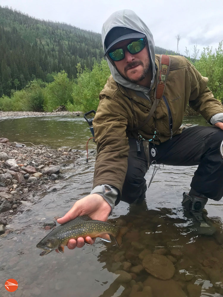 Chris Allen holding a brook trout in Colorado | Fly Fishing Fix